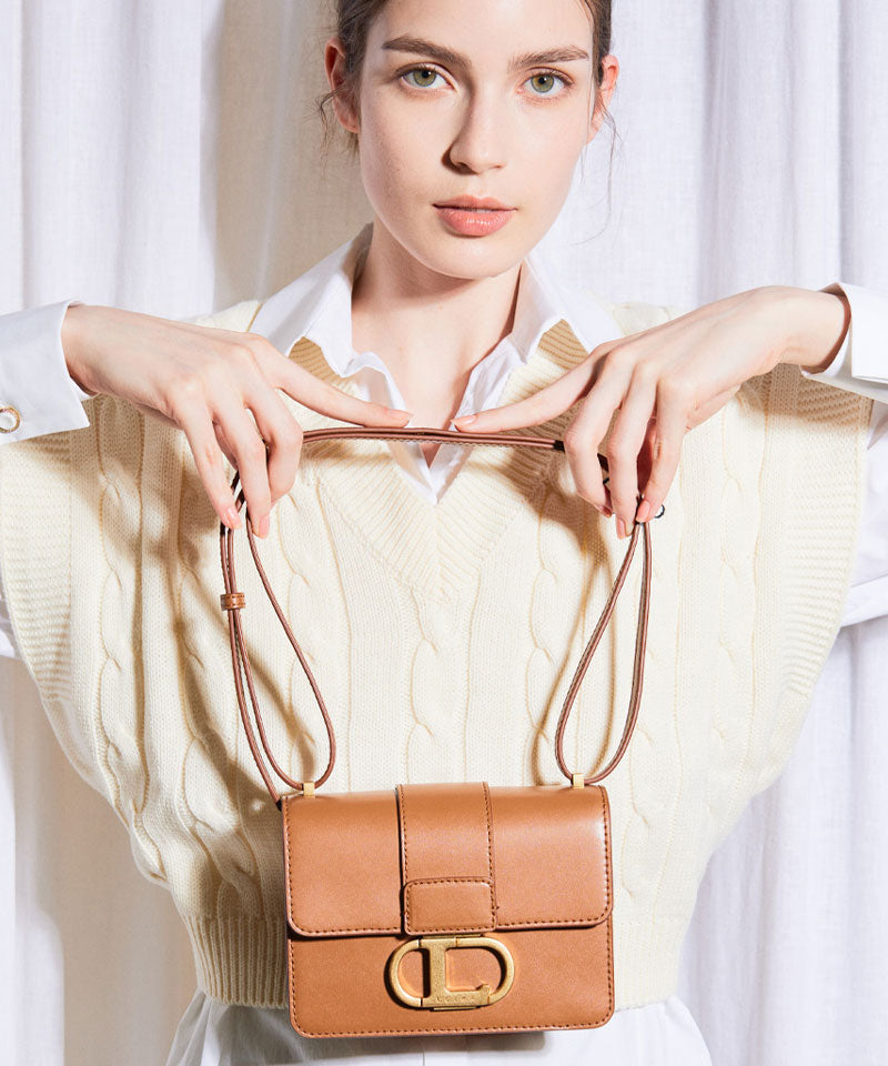 Objet S genuine leather shoulder bag with logo buckle